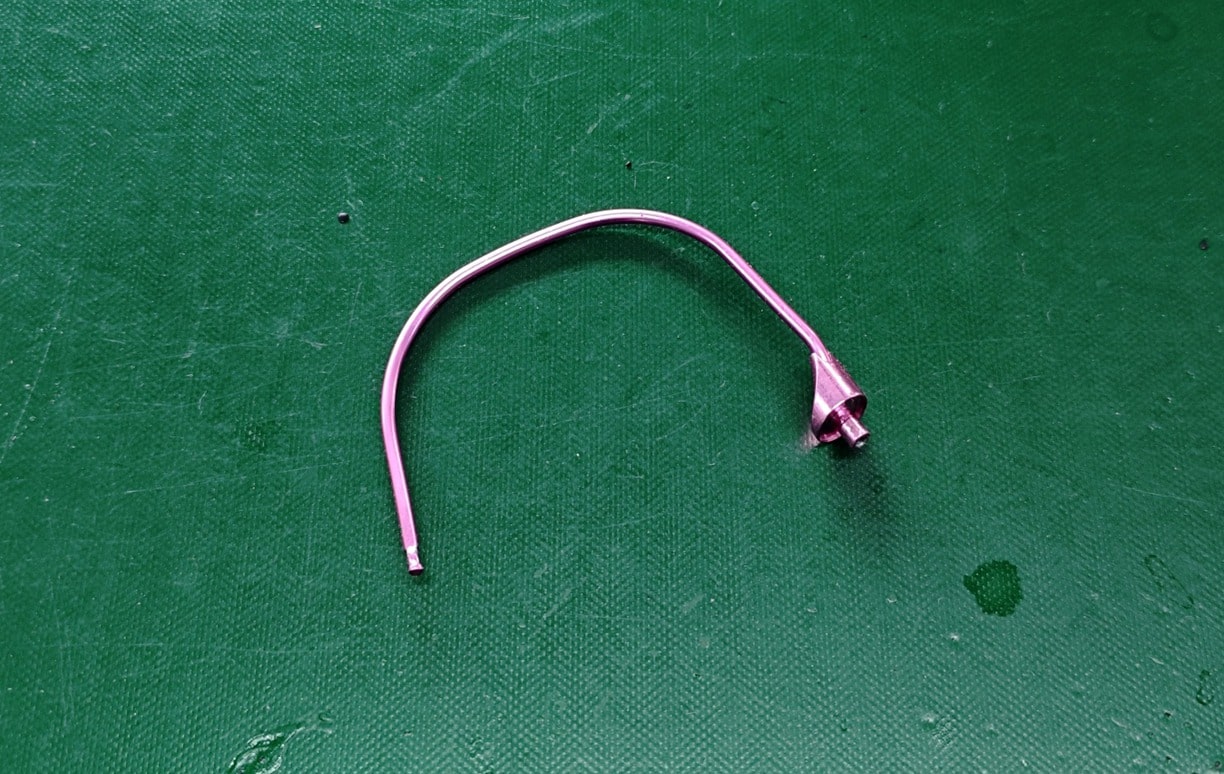 A Pink Fishing Reel Line Roller A Pink Fishing Reel Line Roller